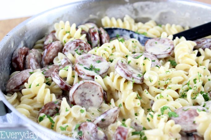 Creamy alfredo sauce, cajun seasoning, and smoked sausage make this Sausage Alfredo a dinner with 5 ingredients, and ready in less than 20 minutes. | EverydayMadeFresh.com