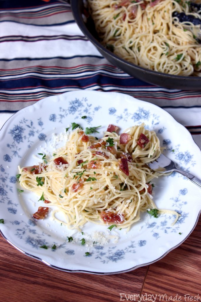 Spaghetti Carbonara is a fancy sounding pasta dish that is simple to prepare. Ready in less than 25 minutes, and requires literally a handful of fresh ingredients.  | EverydayMadeFresh.com