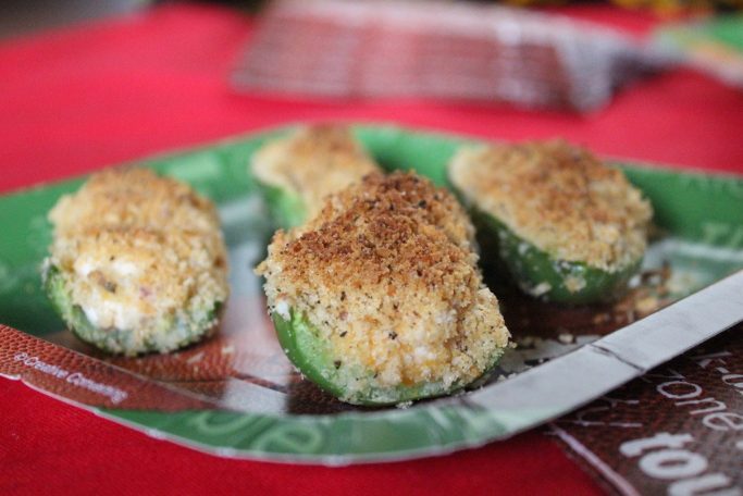 Stuffed with a cream cheese, bacon, and sharp cheddar mixture, topped with panko and baked in the oven, these baked jalapeno poppers are delicious!