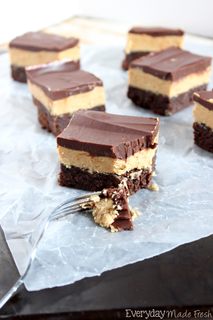 Doctor up your favorite boxed brownie mix, with this easy recipe for Peanut Butter Stuffed Brownies. You get 3 decadent layers, fudgy chewy brownie, thick and luscious peanut butter, topped with a chocolate ganache. | EverydayMadeFresh.com