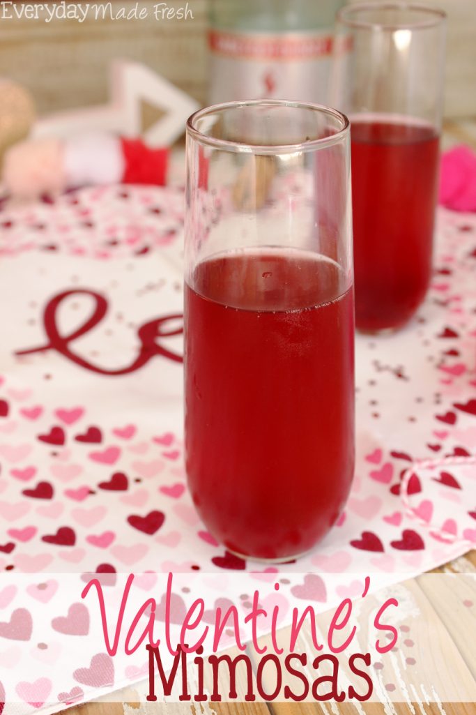 The perfect drink to enjoy on the official "love" day has to be red! These Valentine's Mimosas are made with pink champagne and pomegranate juice; the perfect combination. | EverydayMadeFresh.com