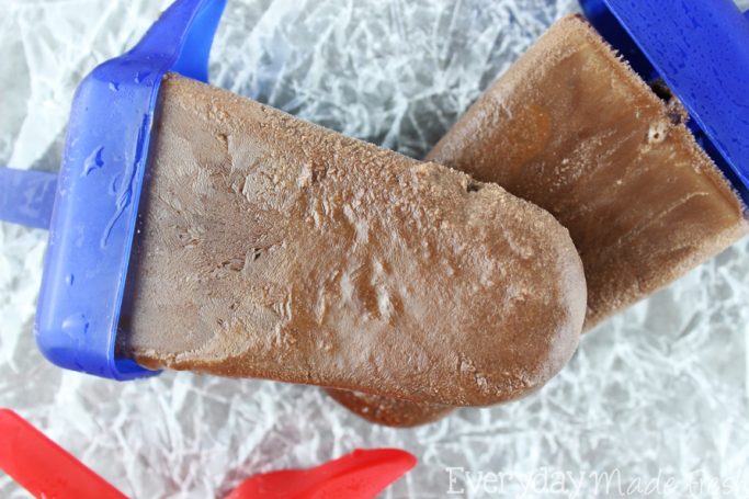 Chocolate fudgey goodness in the form of our summer favorite, popsicles! The Best Homemade Fudgesicles are made with 4 ingredients, and you will want to always have them in the freezer! | EverydayMadeFresh.com