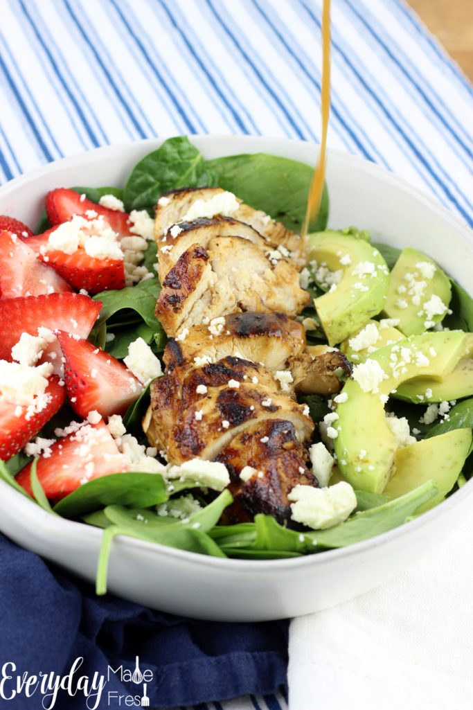 This healthy Balsamic Chicken & Spinach Salad is made with a simple homemade dressing that's mixed together in no time. The feta and strawberries pair so perfectly with it. | EverydayMadeFresh.com