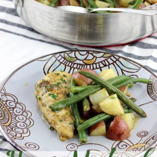 This Honey Mustard Chicken and Vegetables is made in one pan, with a sweet and tangy sauce that pairs perfectly with the green beans and potatoes. It's a family pleasing meal that makes for the perfect complete meal. | EverydayMadeFresh.com