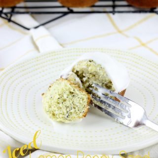 These insanely moist Iced Lemon Poppy Seed Muffins are bursting with lemon flavor! They are topped with a lemon cream cheese icing that will make mornings perfect. | EverydayMadeFresh.com