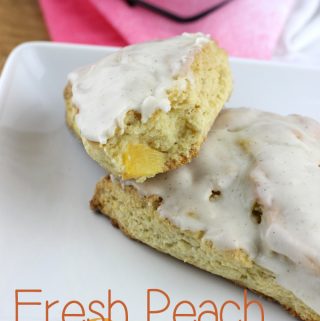 Nothing says summer like fresh peaches - and these Fresh Peach Scones & Vanilla Bean Glaze are the perfect summer breakfast or sweet treat! | EverydayMadeFresh.com