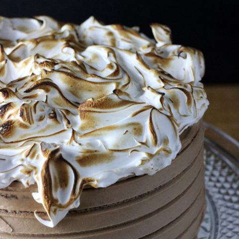 This S'mores Cake is going to knock your socks off! A graham cracker cake, milk chocolate buttercream, and toasted marshmallow topping, all made from scratch; it's much easier than you think. | EverydayMadeFresh.com