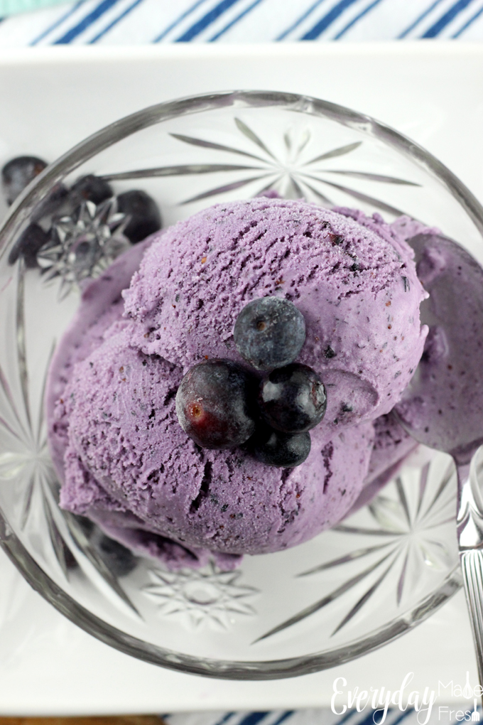 This Blueberry Ice Cream is made with fresh blueberries, and is perfectly rich and creamy. It's a great way to cool off this summer. | EverydayMadeFresh.com