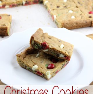 When you need to serve warm fresh baked cookies fast these Christmas Cookies for a Crowd are the answer. Baked in a sheet pan and filled with all the chocolate! | EverydayMadeFresh.com