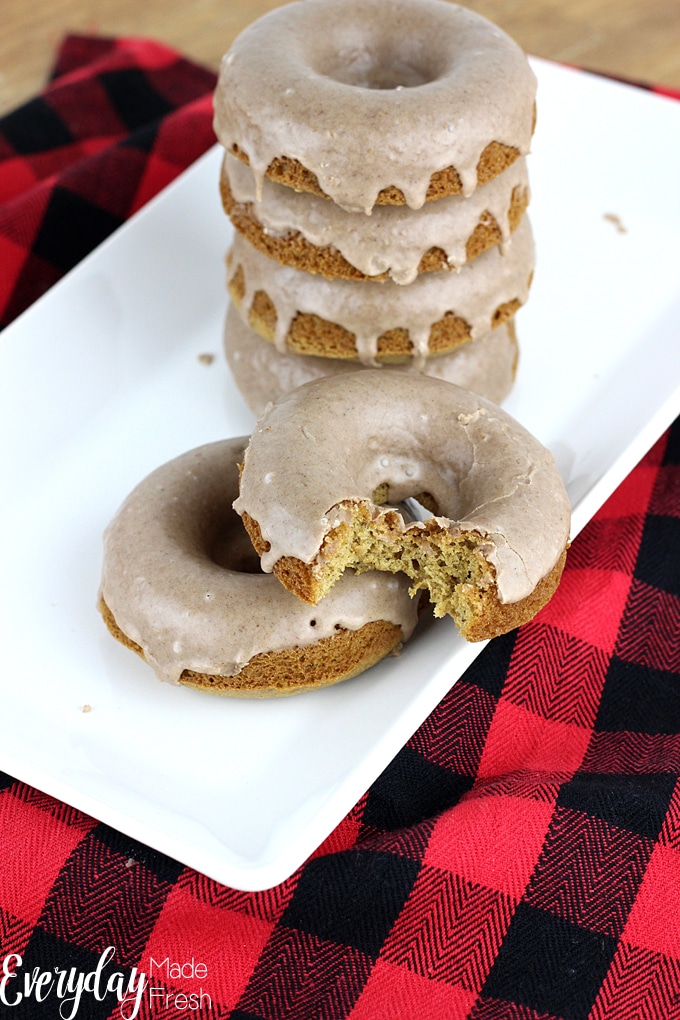 These Gluten Free Baked Apple Cider Donuts are moist and cake-like on the inside, and topped with a cinnamon glaze!  | EverydayMadeFresh.com