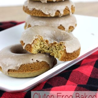 These Gluten Free Baked Apple Cider Donuts are moist and cake-like on the inside, and topped with a cinnamon glaze! | EverydayMadeFresh.com