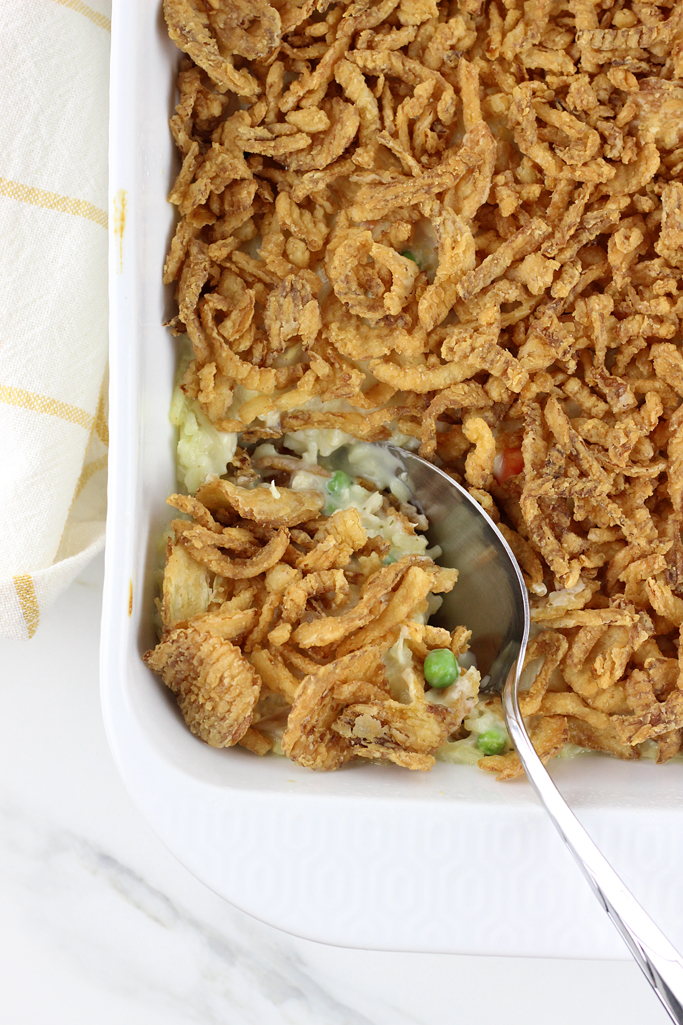 Grandma's Chicken and Rice Casserole is a classic family favorite. Oven, Slow Cooker & Instant Pot Directions! This casserole is a great way to use a rotisserie or leftover chicken. A creamy sauce with peas and carrots tie this together for a complete meal.
