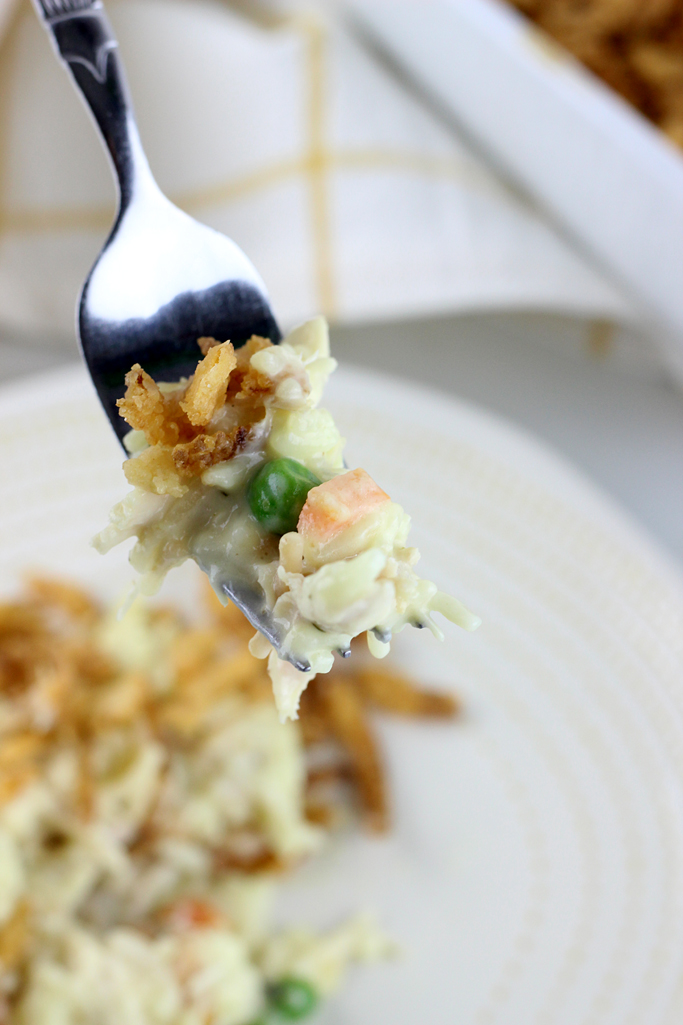 Grandma's Chicken and Rice Casserole is a classic family favorite. Oven, Slow Cooker & Instant Pot Directions! This casserole is a great way to use a rotisserie or leftover chicken. A creamy sauce with peas and carrots tie this together for a complete meal.