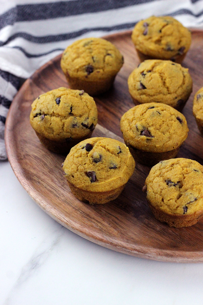 Packed with pumpkin and chocolate chips, these Mini Pumpkin Chocolate Chip Muffins are simple to make, and a great way to enjoy the flavors of fall, all in one bite!
