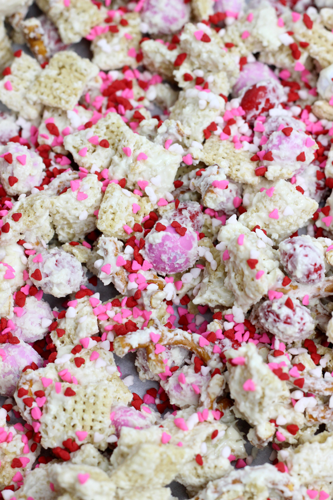 Cupid Crunch is an easy Valentine's Day recipe. Sweet and salty, this white chocolate coated Valentine's Day recipe for kids is fun to eat and easy to make.